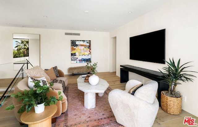 living room featuring hardwood / wood-style floors