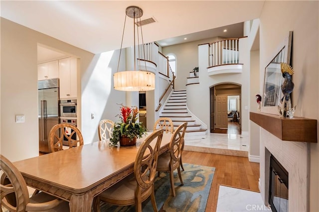 dining room featuring light hardwood / wood-style floors and plenty of natural light