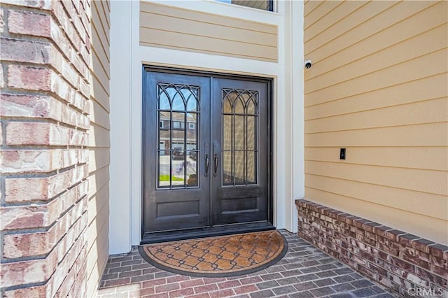 doorway to property featuring french doors