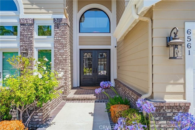 view of exterior entry with french doors