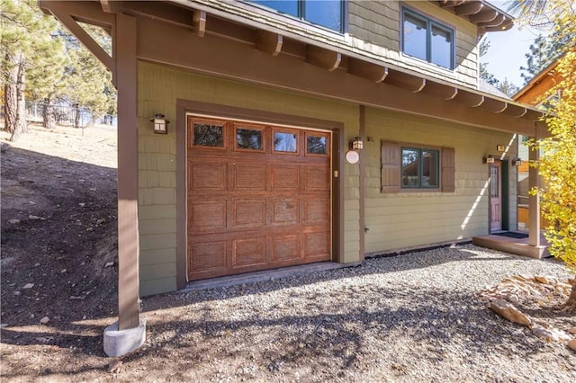 property entrance with a garage