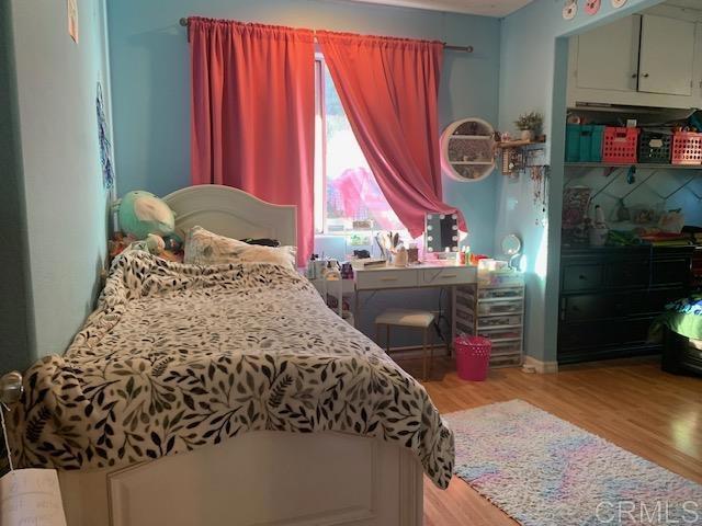 bedroom featuring light hardwood / wood-style floors