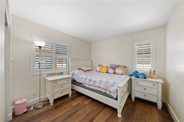 bedroom featuring dark wood-type flooring