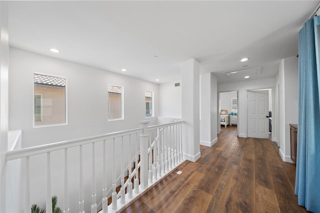 hallway with dark hardwood / wood-style floors