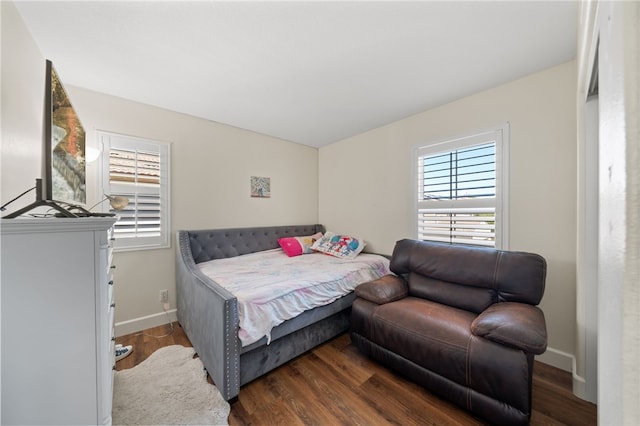 bedroom featuring dark hardwood / wood-style floors