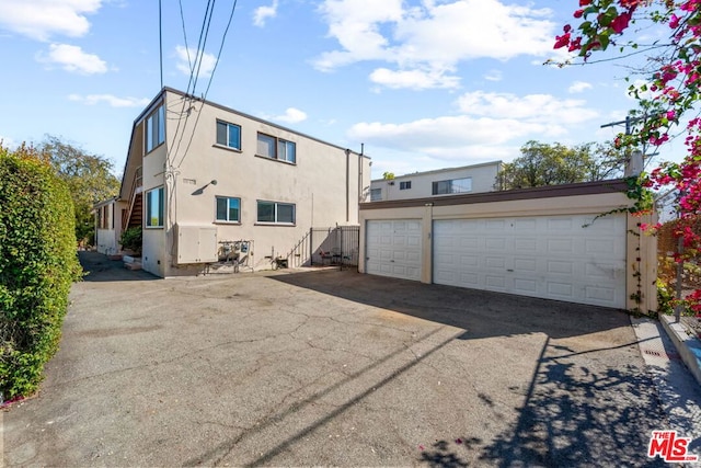 exterior space featuring a garage