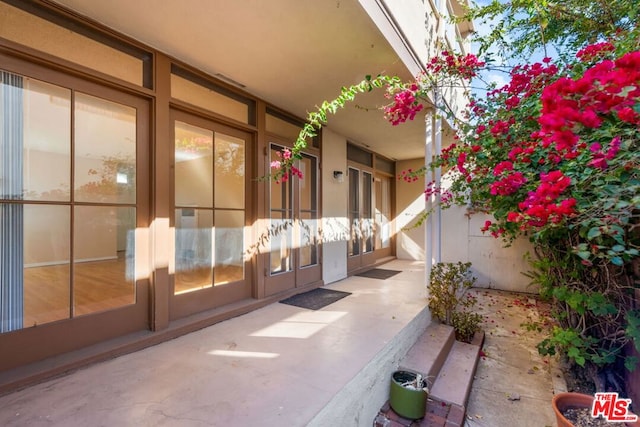 view of patio featuring french doors