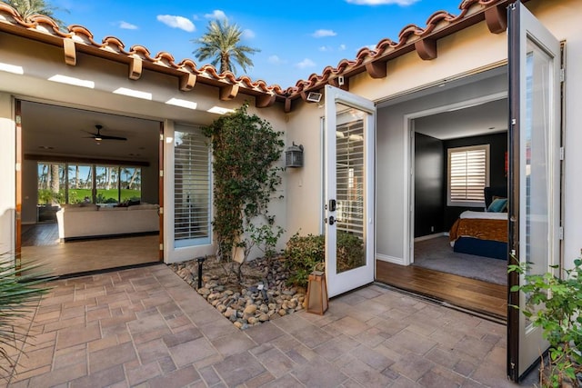 doorway to property featuring a patio