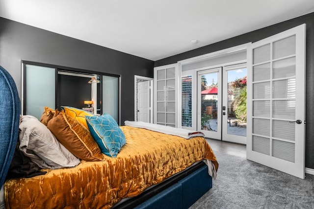 carpeted bedroom with french doors and access to outside