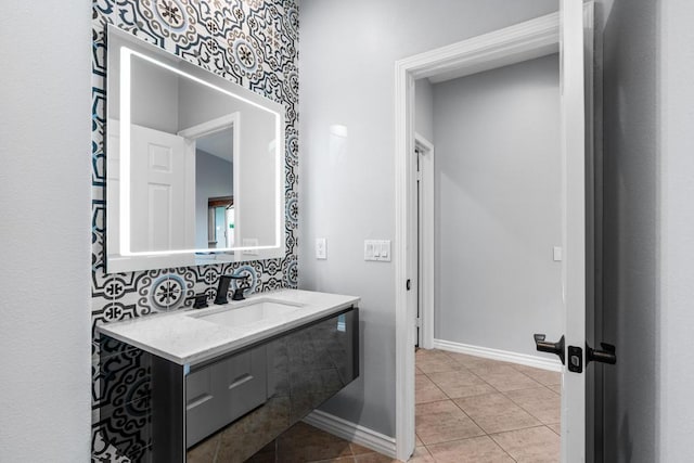 bathroom featuring decorative backsplash, tile patterned flooring, and vanity