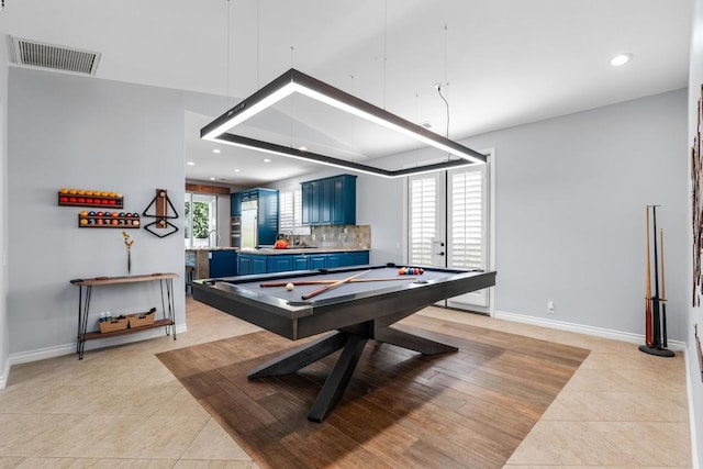 rec room with light tile patterned floors, french doors, and pool table