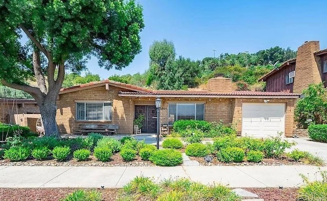 view of front of property featuring a garage