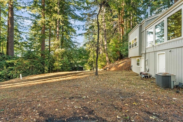 view of yard with central AC