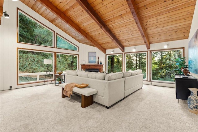 living room with light carpet, wooden walls, wood ceiling, high vaulted ceiling, and beamed ceiling