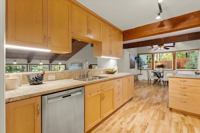 kitchen featuring sink, ceiling fan, light hardwood / wood-style flooring, stainless steel dishwasher, and light stone countertops