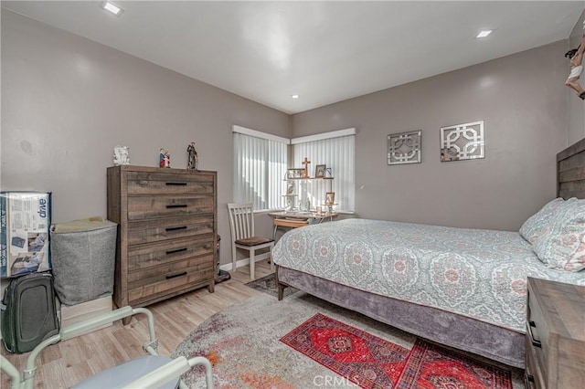 bedroom featuring wood-type flooring