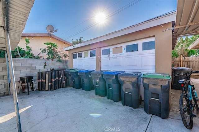 view of patio / terrace with a garage