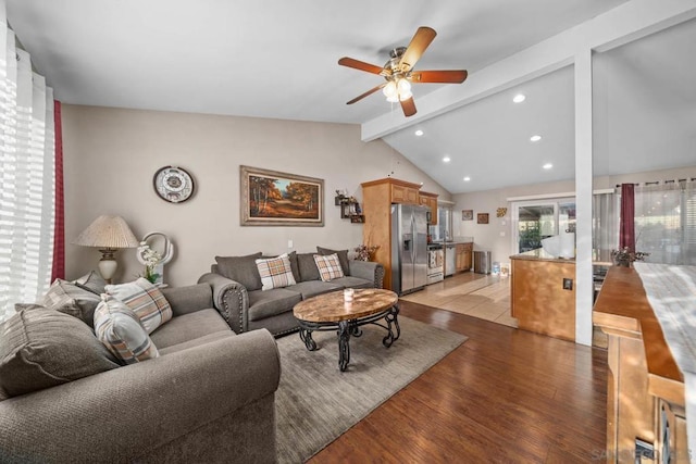 living room with vaulted ceiling with beams, light hardwood / wood-style flooring, and ceiling fan