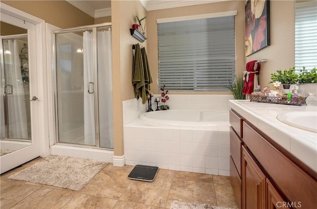 bathroom featuring vanity, separate shower and tub, and crown molding