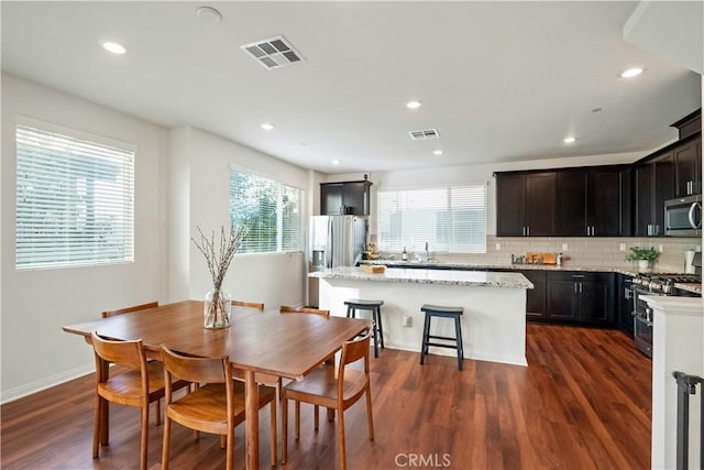 dining room featuring dark wood-type flooring