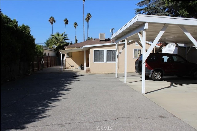 view of front of house with central air condition unit