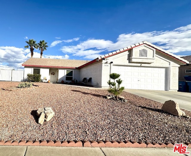 single story home with a garage