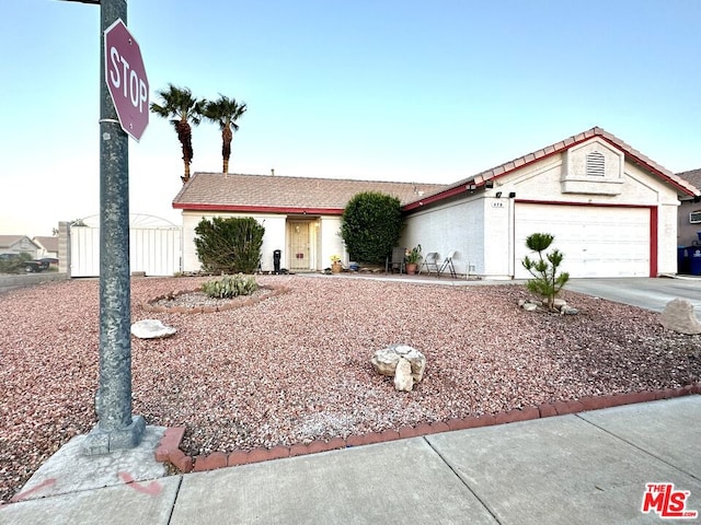 view of front of home with a garage