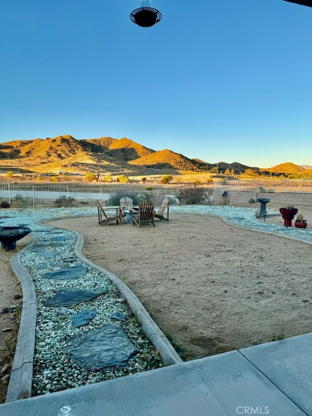 surrounding community featuring a mountain view