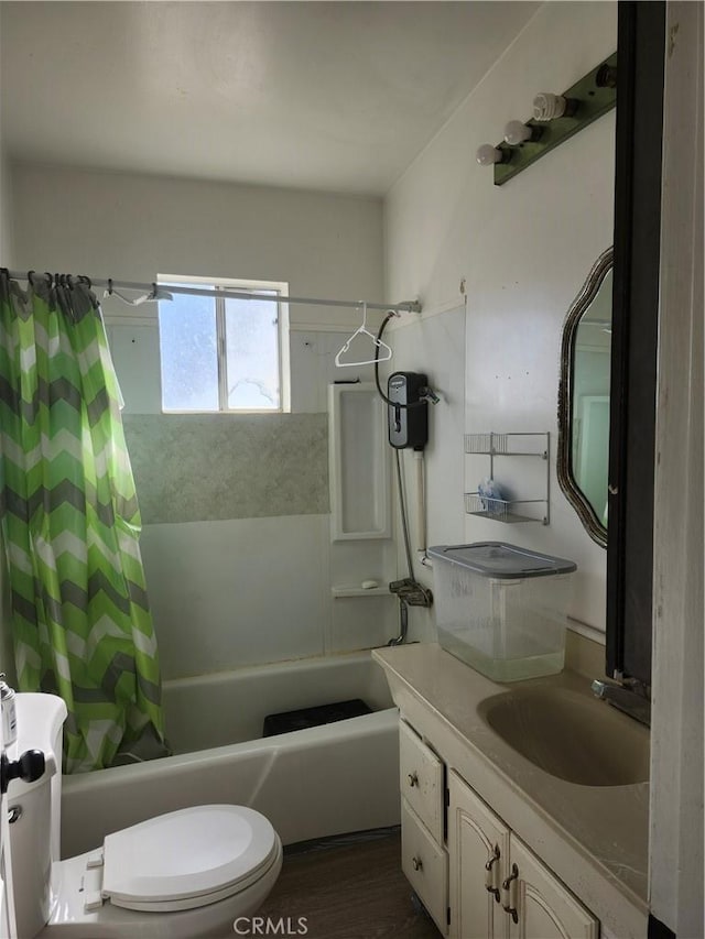 full bathroom with shower / bath combination with curtain, toilet, wood-type flooring, and vanity