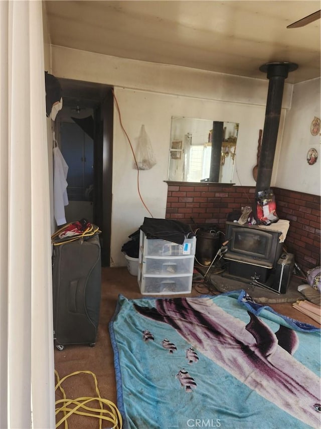 miscellaneous room featuring a wood stove