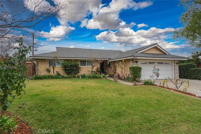 ranch-style house with a front lawn and a garage