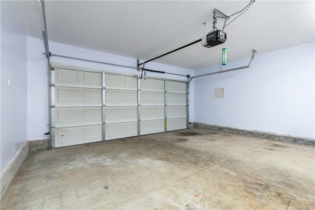 garage featuring a garage door opener