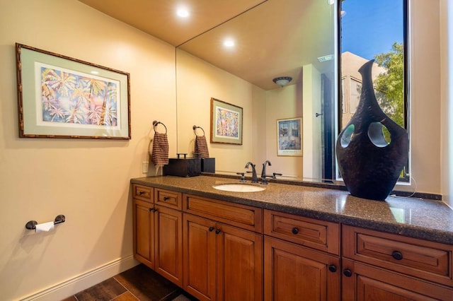 bathroom featuring hardwood / wood-style floors and vanity