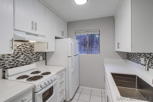 kitchen featuring tasteful backsplash, white range with electric stovetop, sink, white cabinets, and light tile patterned flooring