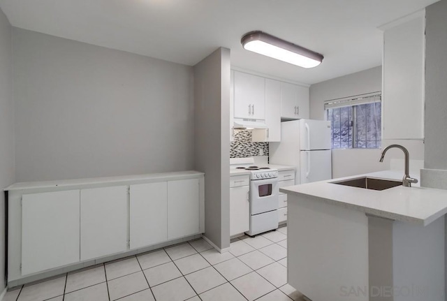 kitchen featuring white cabinets, light tile patterned floors, white appliances, and sink