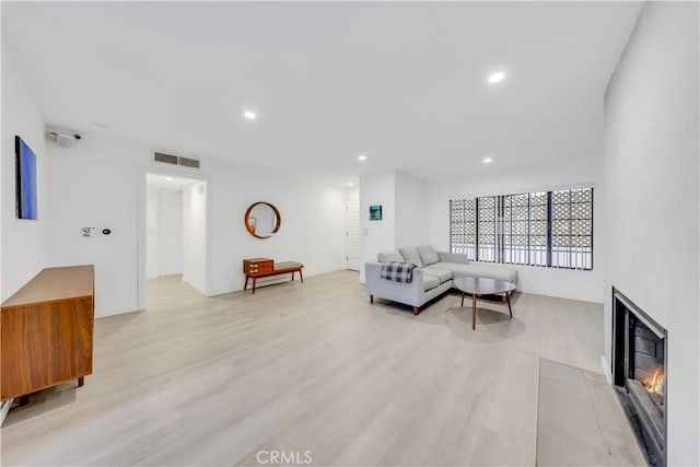 living room featuring light wood-type flooring