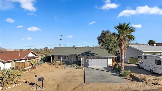 ranch-style home with a garage