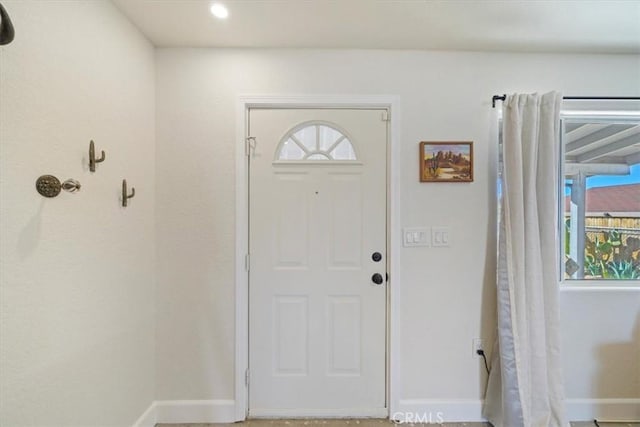 foyer featuring a healthy amount of sunlight