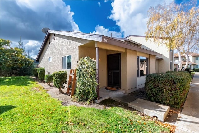 exterior space featuring a front lawn