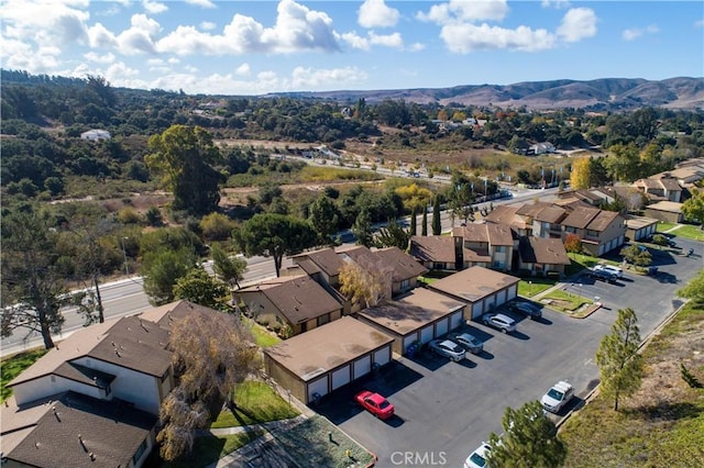 drone / aerial view featuring a mountain view