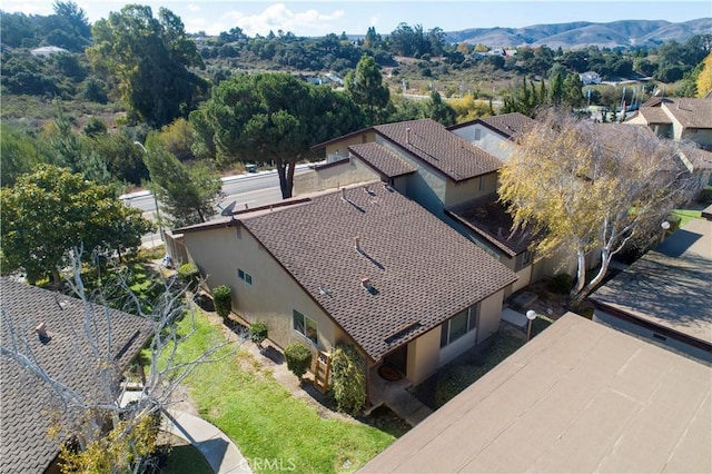 drone / aerial view featuring a mountain view