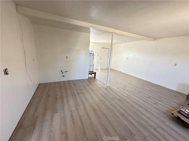 spare room with light wood-type flooring