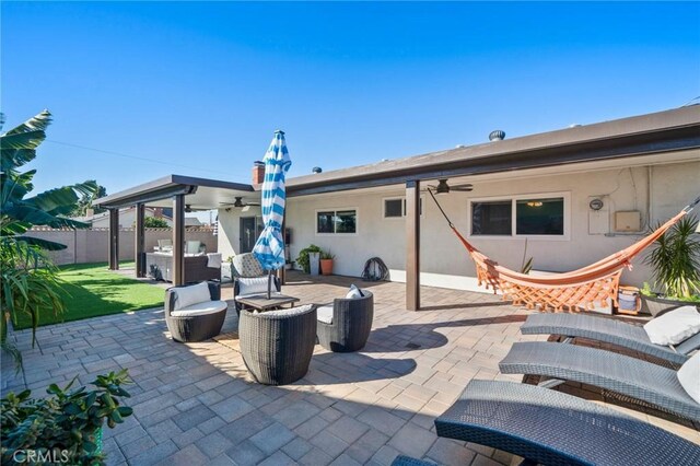 view of patio / terrace featuring outdoor lounge area and ceiling fan