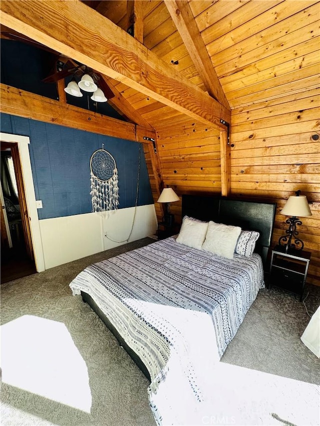 bedroom with carpet floors, wood ceiling, and vaulted ceiling with beams
