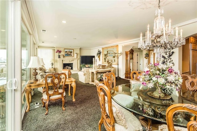 dining room with carpet floors and ornamental molding