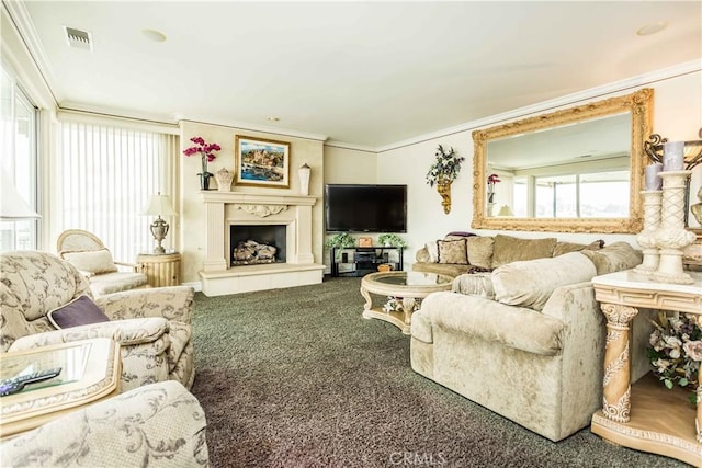 carpeted living room featuring ornamental molding