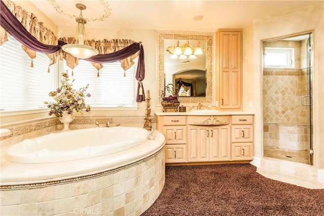 bathroom with separate shower and tub and vanity