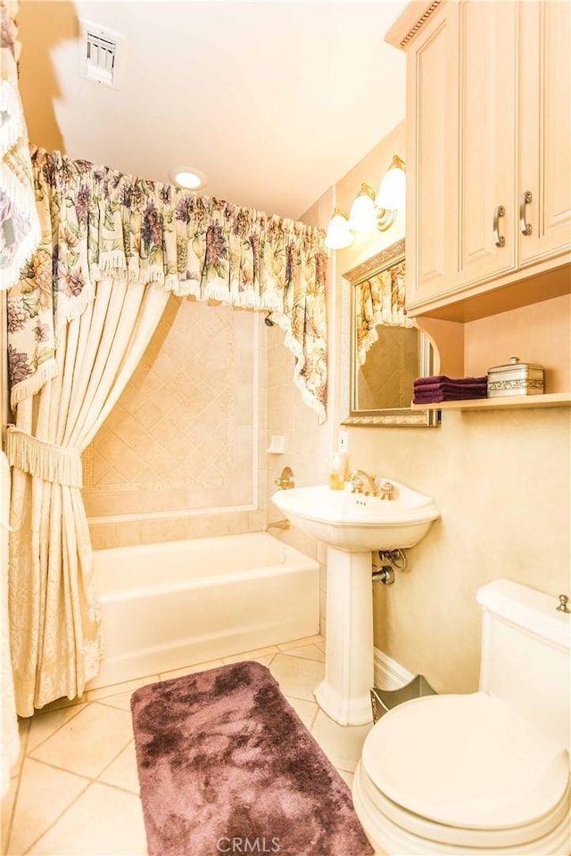 1203 Bayside Dr, Corona Del Mar, CA 92625 - bathroom featuring tile patterned floors, toilet, and shower / tub combination