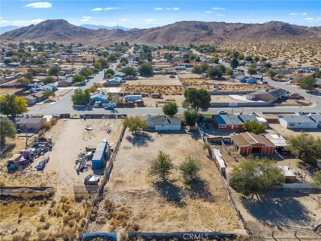 drone / aerial view featuring a mountain view