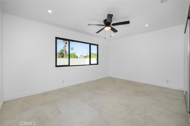 unfurnished room with ceiling fan